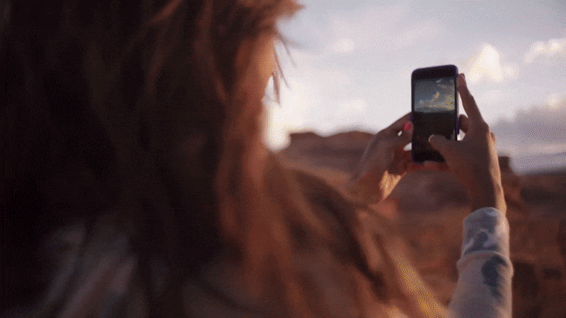 A person filming a Story on their phone